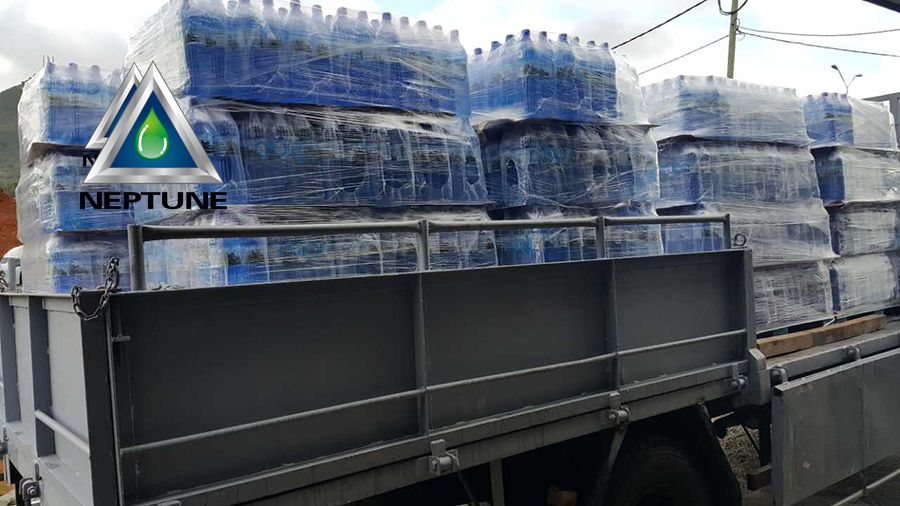 bottle water plant loading wrap bottle water into truck for freight to